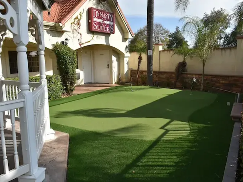 Putting green recreation area at Dynasty Suites Redlands.